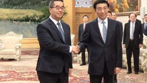 Wang Huning настоява за мир между двете страни на пролива и обмен в преговорите с KMT на Тайван